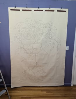 After sewing rod gutters, the linen tapestry is hung to cast the design and draw with soft charcoal pencil.