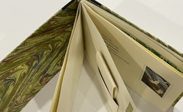 Album with marbled paper and decorative pages