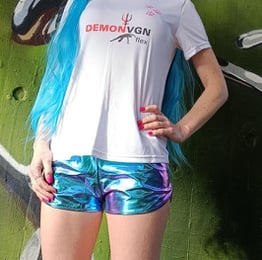 A vegan athlete with blue cyberpunk shorts
