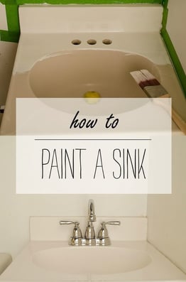 a sink with a green paint job on it and a white sink