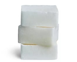 a stack of soap bars with soap and soap