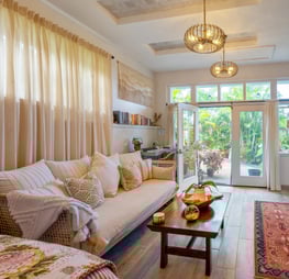 a beautifully decorated living room with a couch and a table