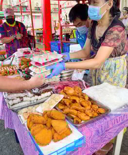 Local Chinese food market in Polynesia, featuring colorful fresh produce and traditional ingredients.