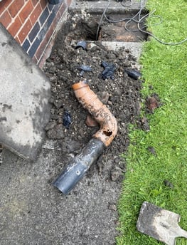 Broken gully pipe