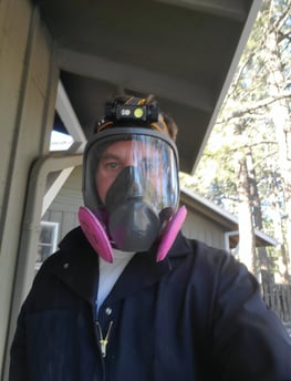 Inspector Felix in his PPE after inspecting a crawlspace at a home in Evergreen.