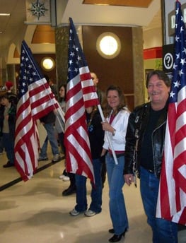 Veterans gathering at a community event, highlighting camaraderie and engagement.