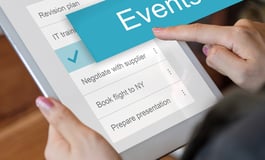 A virtual assistant app on a tablet, displaying a calendar with events and reminders. 