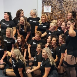 The Sass and Soul team in front of the SweetAz Co. rose gold shimmer wall hire at HOTA, Gold Coast