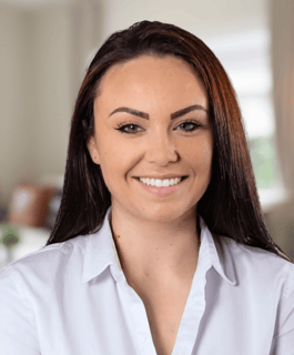 a woman with a smile on her face