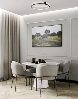 a dining room with a table and chairs