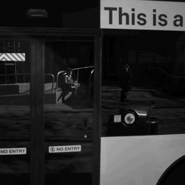 Reflections on side of bus in Sydney.