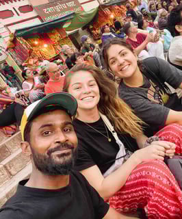 Eva, me, and our local Indian guide on the ghats of Varanasi during a religious ceremony.