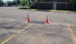 asphalt-repair-in-a-parking-lot.jpg