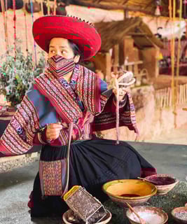 Portrait of a Peruvian woman making handicrafts in the Sacred Valley near Cuzco.