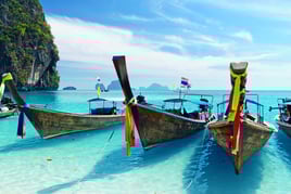 a number of boats in the water