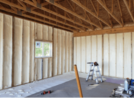 spray foam insulation inside of a house in lakewood, colorado