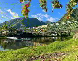 View of the bridge leading to Teahupoo with the 2024 Olympic Games logo displayed, Tahiti, French Polynesia.
