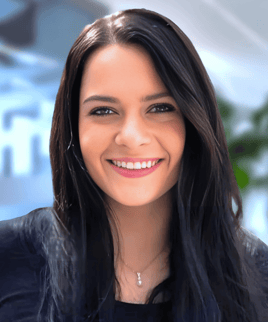 a woman with long hair and a black top