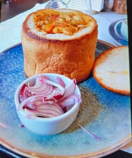 Bean soup served in bread, Romania