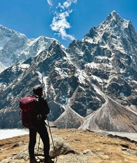 Manon looking at the Taboche peak, Nepal.