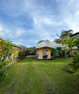 accommodation surrounded by lush greenery on the island of Huahine, French Polynesia.