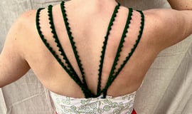 Back straps of green, white, and red sundress
