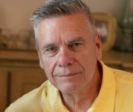 Spiritual biblical Metaphysical teacher Dr Roy e Richmond in a casual yellow shirt