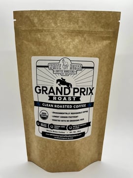 A brown bag with a logo that says White Horse Coffee Grand Prix Roast on it