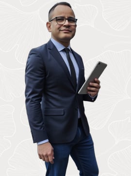 a man in a suit and tie with a tablet, darouiche darouiche