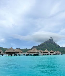 Panoramic view of the vibrant blue lagoon in Bora Bora, French Polynesia.