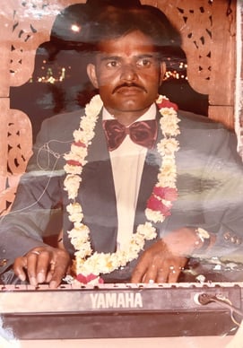 A master playing Casio keyboard in the Manohar Brass Band in the old days.