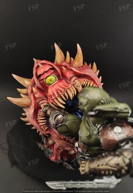 Custom resin diorama of armored sci-fi warrior battling floating creature, painted in brutal style