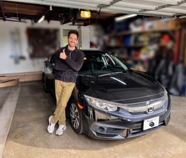 Guys standing in front of 2016 Honda Civic