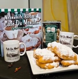 a plate of food and a cup of coffee