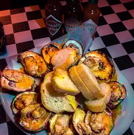 Acme Oyster House oysters on a plate