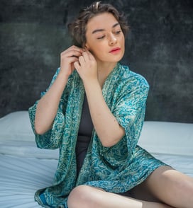 A WOMAN IN BIKINI WITH CAPRI KIMONO KAFTAN BLUE LOUNGE STYLE