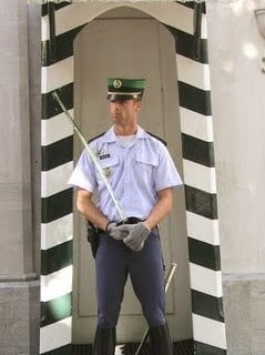 Lisbon - An official guard to a historic building under repair