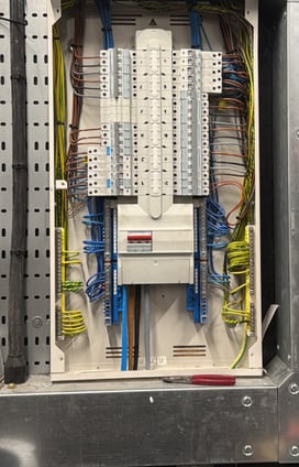 a bunch of electrical equipment in a room