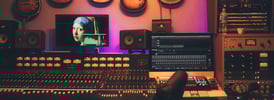a recording studio with a guitar and a guitar