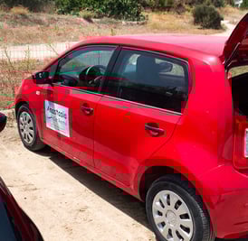 Anastasia's Rental Car in Milos Greece- red small car