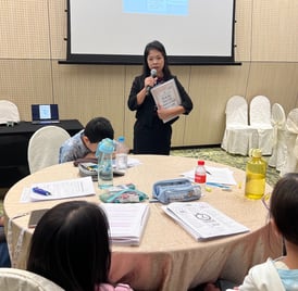 Thriving Kids Club Founder Mrs Serene Wee and students at Intensive English Bootcamp
