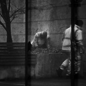 Two workmen reflected in glass on Ladyfield, by the EICC, Edinburgh