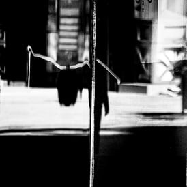 Distorted reflection of a man in the window, Exchange Plaza, Edinburgh