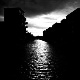 Looking along the Union Canal, in almost total shadow, from Lochrin Basin, Edinburgh