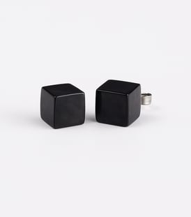 a pair of black pearl stud earring