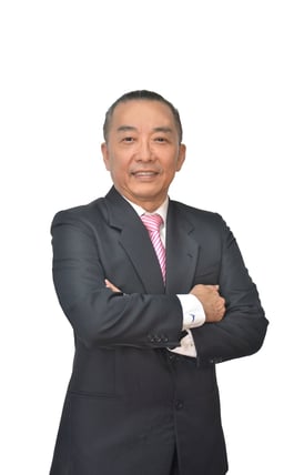 a man in a suit and tie is smiling