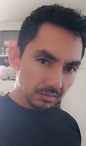 a man with a mustache and mustaches on his face