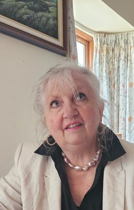 Yvonne at her desk