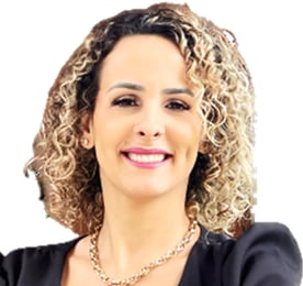 a woman with curly hair and a black jacket