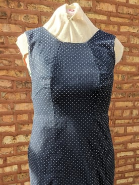 Navy and white polka dot sheath dress
